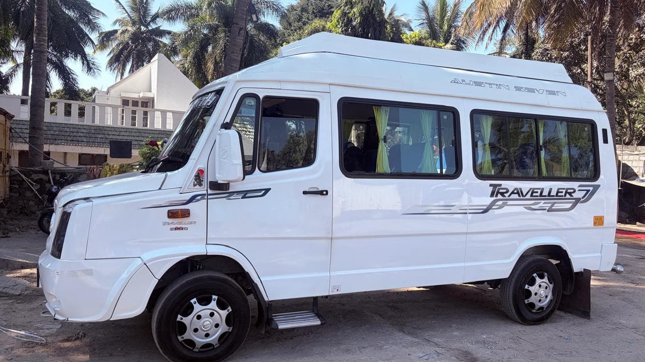 A Sumpreeth Tours and Travels vehicle ready for an outstation trip